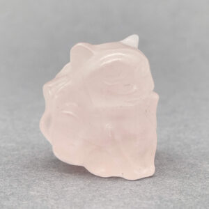 sten krystal ni-halede ræv rosakvarts på grå baggrund