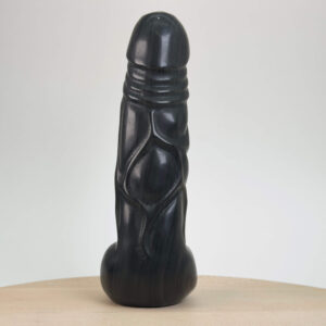 Sort obsidian sølv penis med glimtende sølvreflektioner