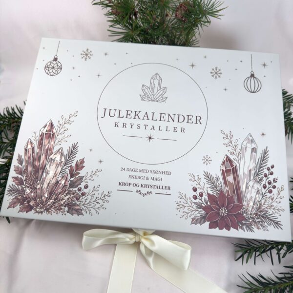 Detalje af krystal julekalender med nummererede låger og dekorativ æske